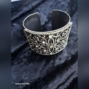 Ladies Silver Tone Cuff Bracelet...3 and 3/4 across.